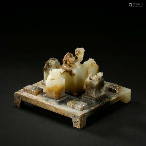 A SET OF CHINESE ANCIENT JADE BEAST SEALS ON STAND