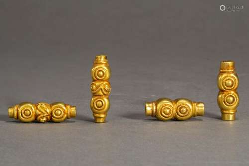 FOUR CHINESE PURE GOLD BEADS HAN DYNASTY