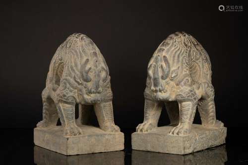 PAIR OF CHINESE BLACK STONE BEAST