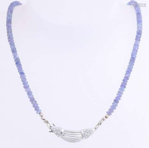 Necklace of tanzanite beads with silver pendant /