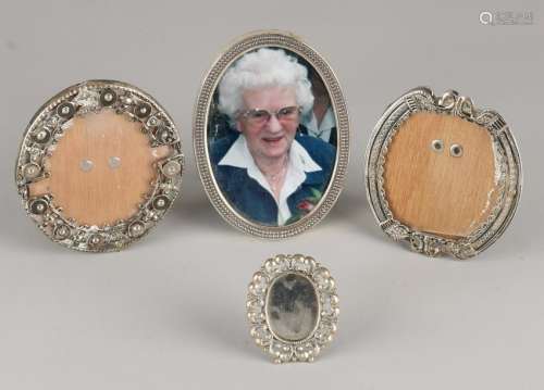 Four silver photo frames, 835/000, 2 oval frames made