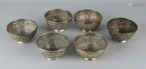 Six rice bowls with Djokja decor, silver-plated. Placed