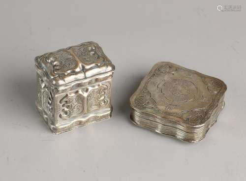 Two silver boxes, 835/000, a square contoured