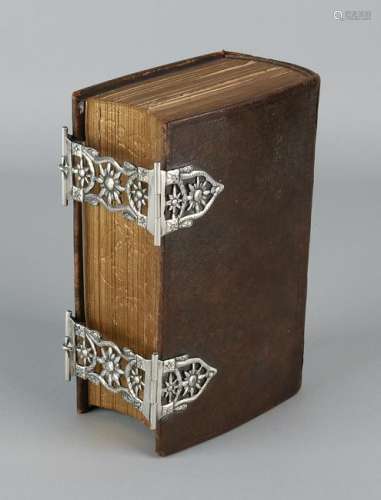 Antique bible with brown leather cover, with gold on