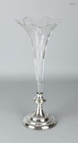 Beautiful crystal vase, Flute, placed on a silver base.