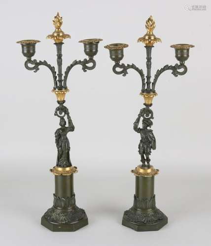 Two 19th century bronze two-light candle holders with