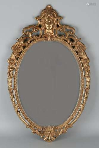 Brass mirror with woman's face. Second half of the 20th