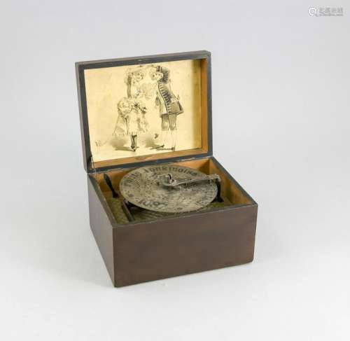 Antique music box with lithography and engraved lid.