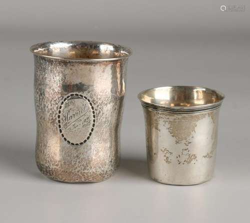 Two silver cups, a small cup with a double fillet edge,