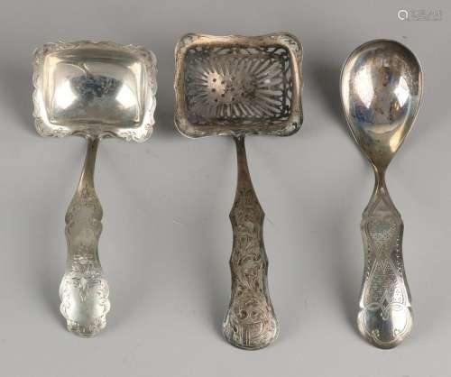 Three silver spoons, 833/000, with a scoop with a