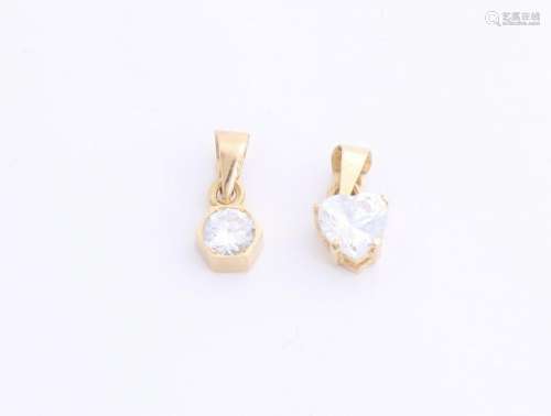 Two gold pendants, 585/000, with zirconia, one cut
