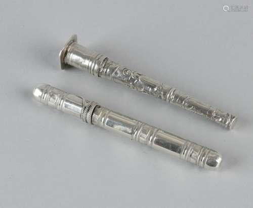 Two silver needle sleeves, 833/000, cylindrical model,