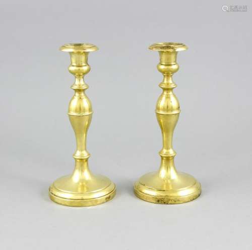 Two antique brass candle holders. Circa 1900. Size: 21