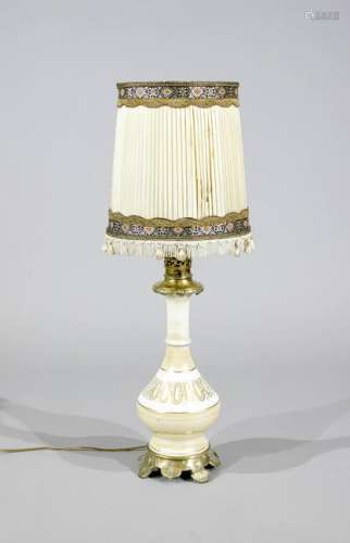 Large antique porcelain lamp with brass base. Circa