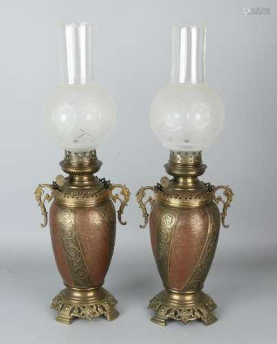 Two 19th century copper processed petroleum lamps.