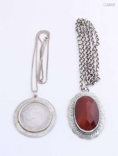 Two silver necklaces with pendants, 833/000, jasseron