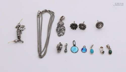 Lot with small silver pendants, with amongst others