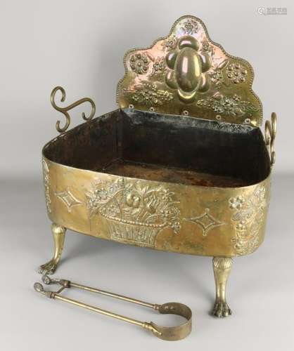 19th century brass carved coal trough with coal tongs.