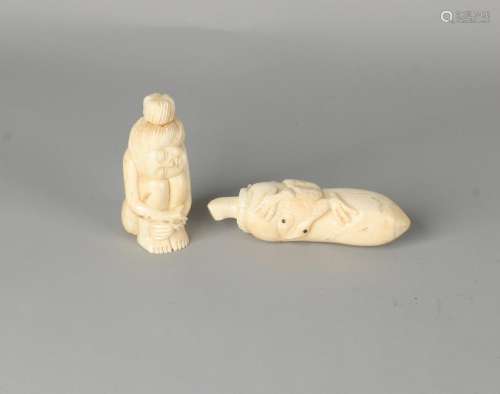 Two old Eastern leg snuffbottles with screw closure.