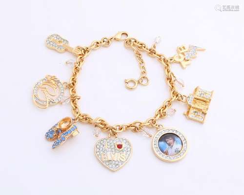 Double bracelet, Elvis Memphis with various charms.