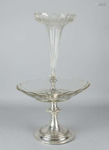 Crystal table piece on a heavy silver round base,