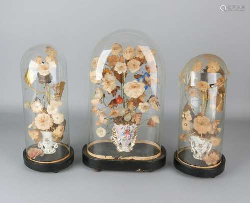Three 19th century porcelain vases with silk flowers