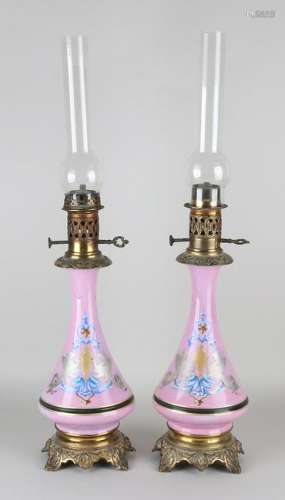Two antique hand-painted porcelain petroleum lamps with