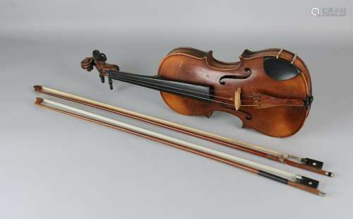 Antique violin with two bows. Circa 1900. Dimensions: