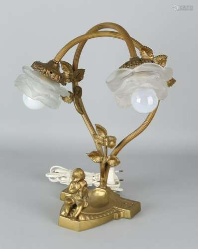 Antique bronze desk lamp with putti. Two light. Circa