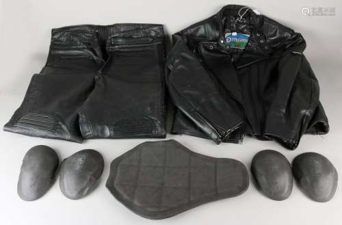 Old, well-kept leather motorcycle suit + protectors.