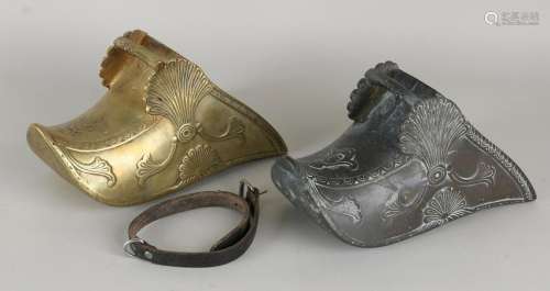 Two 19th century brass stirrups. One polished, one