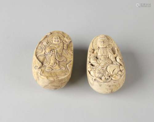 Two ancient Eastern natural stone belt buttons with