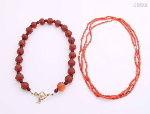 Two necklaces, one long necklace of blood coral from 4