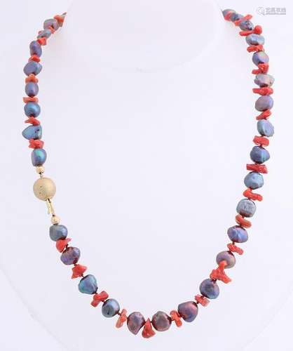 Necklace consisting of red coral and black pearls with