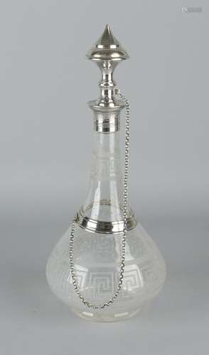 Crystal carafe with etched meander motif and provided