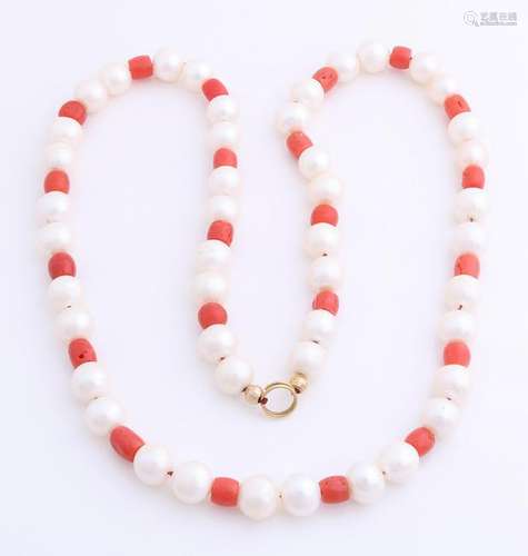 Pearl and coral necklace attached to a yellow gold