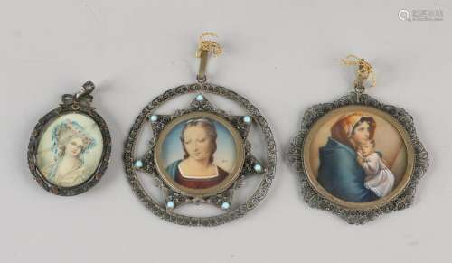 Three old / antique miniatures with brass frames.