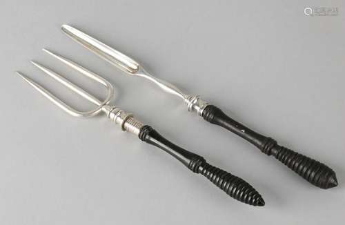 Silver meat fork and marrow drill with ebony handle.