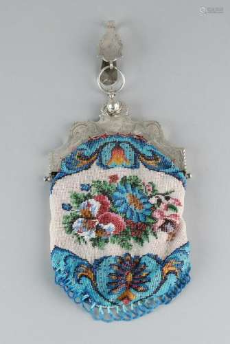 Bead bag with 18th century silver brace, parrot brace