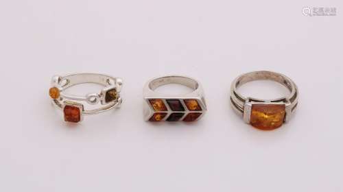 Lot with 3 silver rings with amber, 925/000, ø 52