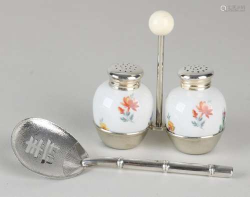 Silver spoon and porcelain jars with silver sprinkler