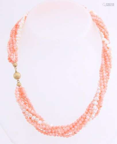 Necklace of angel skin corals and pearls attached to a