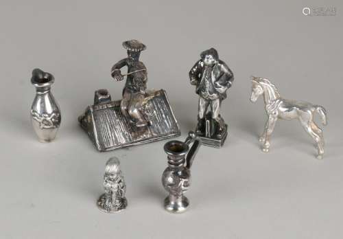 Lot with silver overlay including a horse, vases,