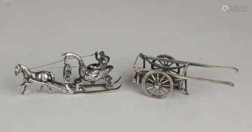 Two silver miniatures, 835/000 & 925/000, A sleigh with