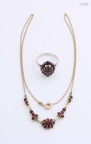 Gold on silver choker with garnet and a silver ring