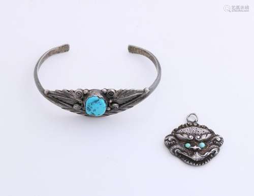 Silver pendant and bracelet with turquoise. Clamp band