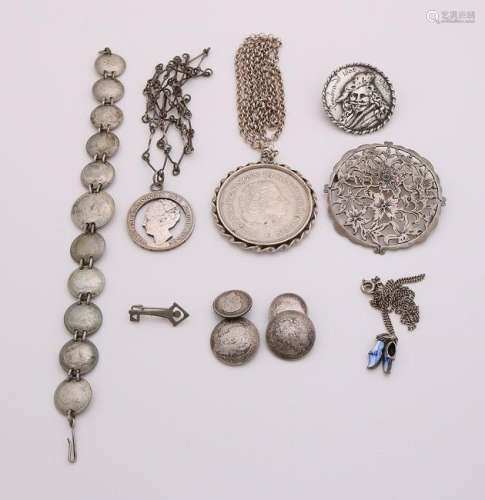 Lot of silver jewelry with coins. 2 Brooches with