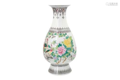 A polychrome porcelain vase, decorated with birds, flowers and characters. Marked with seal mark