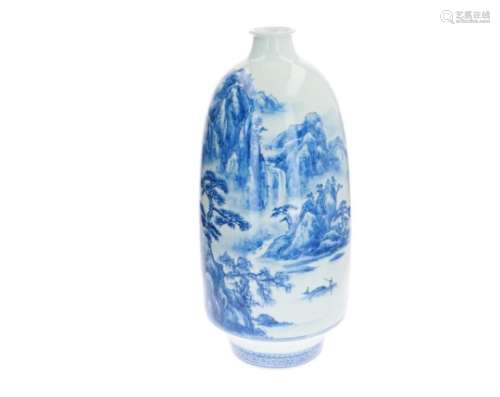 A large blue and white porcelain vase, decorated with a mountainous landscape. Created 1990, by