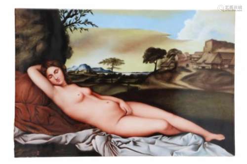 A rectangular polychrome porcelain plaque, decorated with a reclining nude with in the background